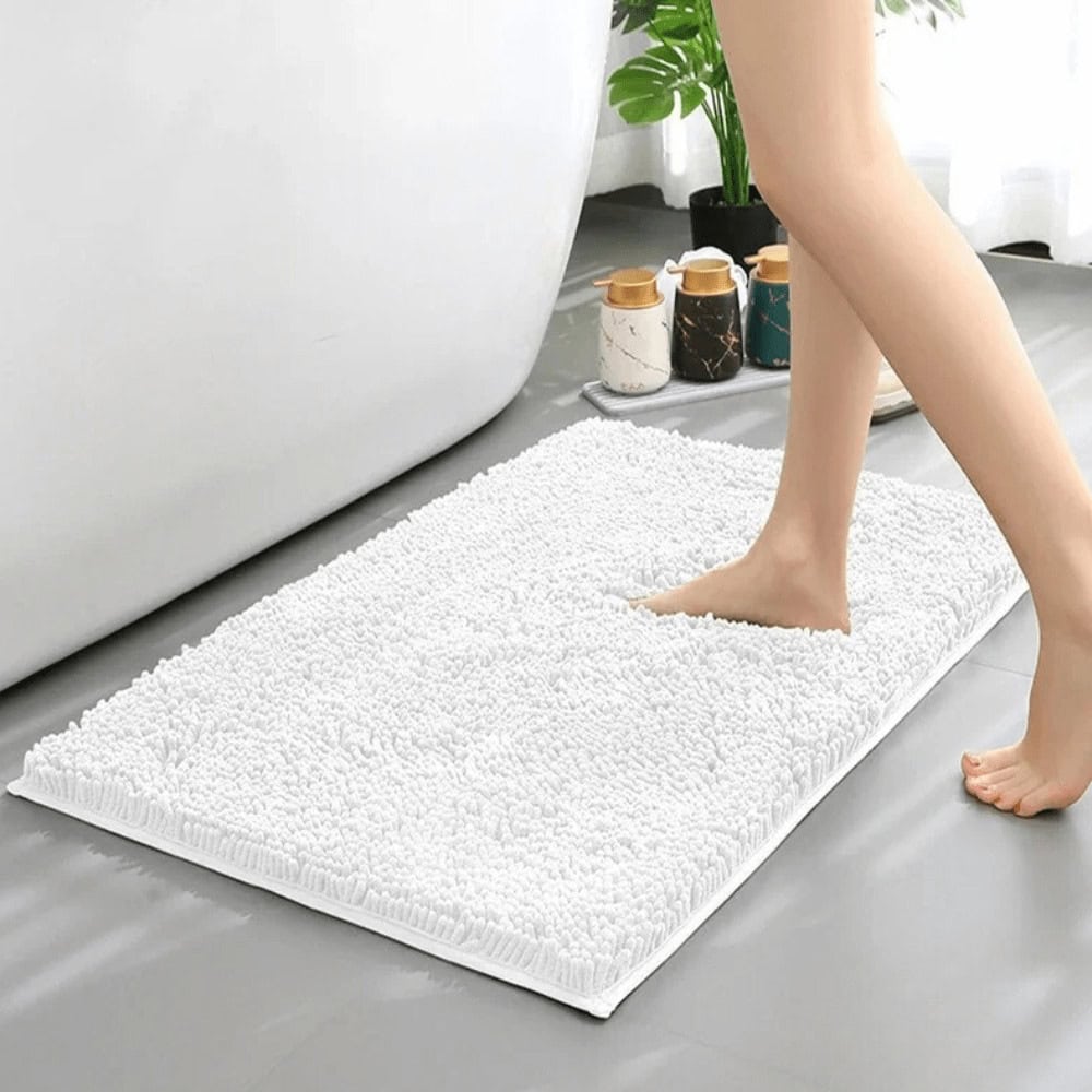 White Chenille Bath Mat for Soft Comfort and Non-Slip Grip.
