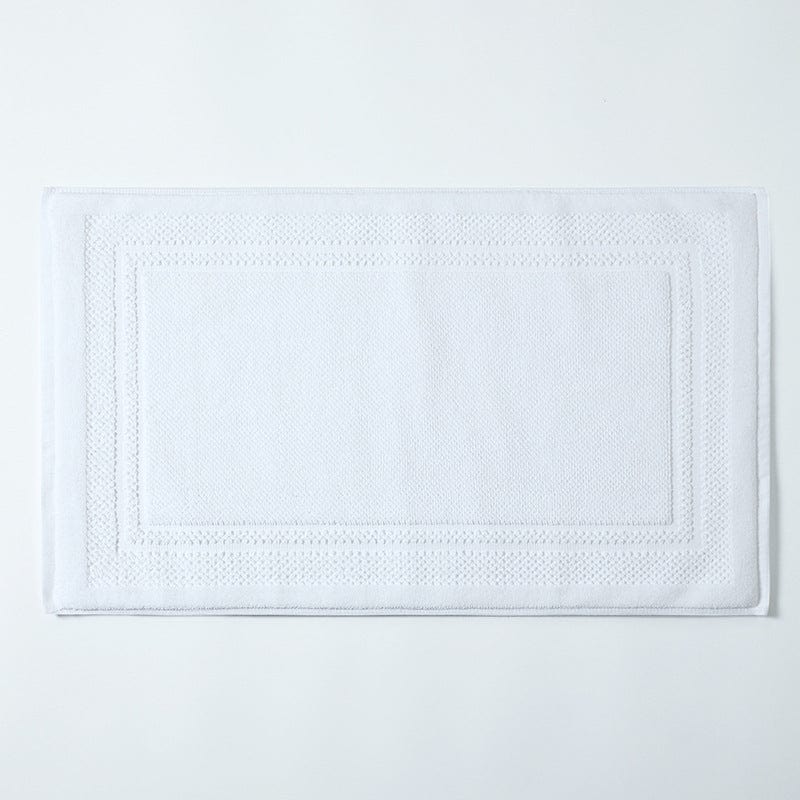 White Cotton Bath Mat with Embroidered Border.