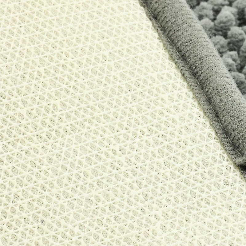 Dark Green Bath Mat with Textured White Surface and Grey Trim.