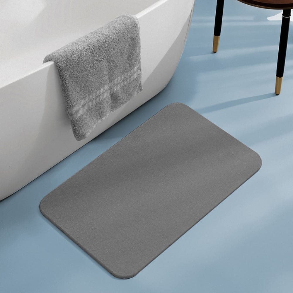 Diatomite bath mat, soft absorbent, grey, bathroom floor, non-slip, modern design.