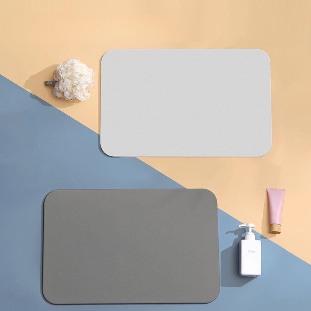 Diatomite bath mat in grey and white, soft absorbent, bathroom essentials.