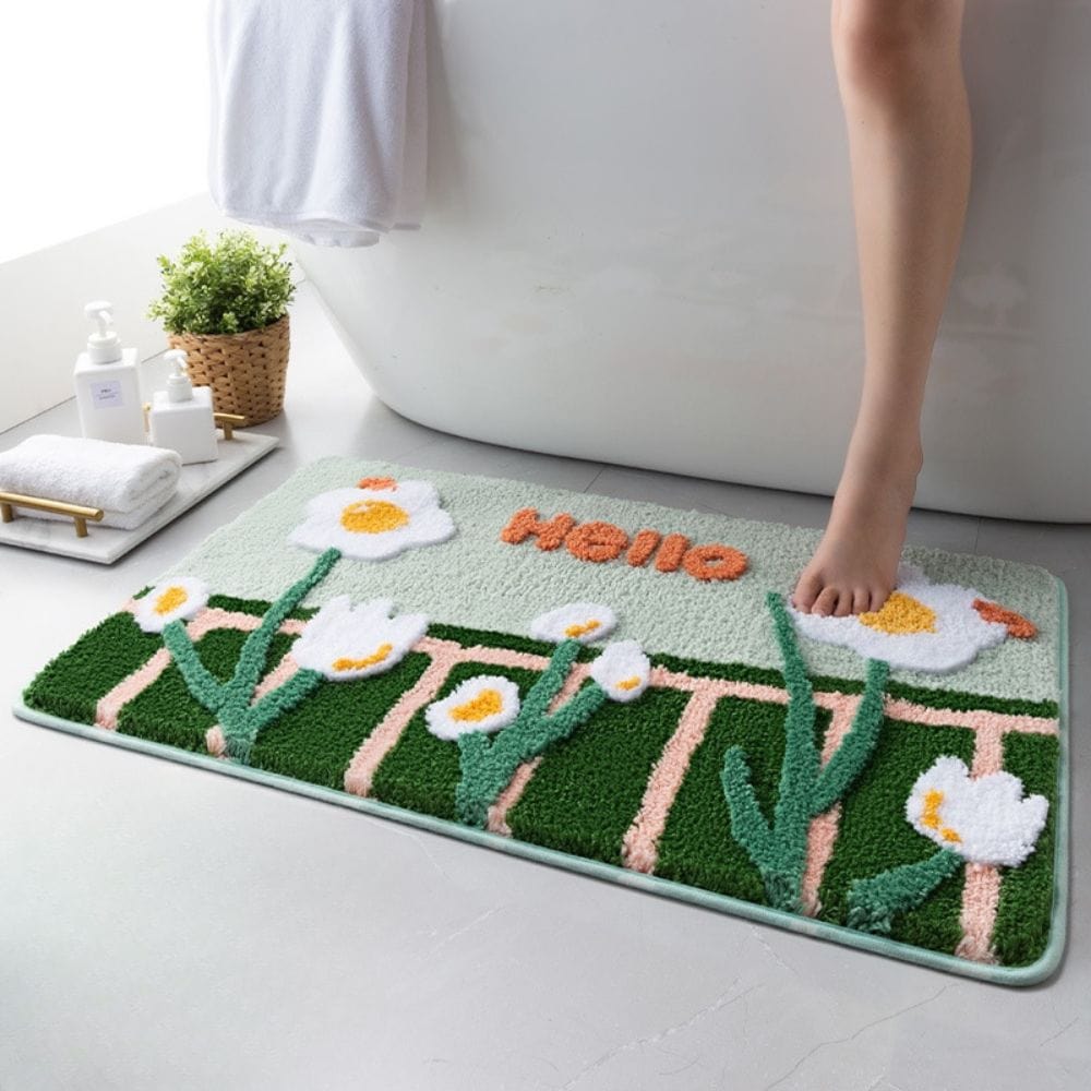 Floral Bath Mat with Daisies and Hello Text.
