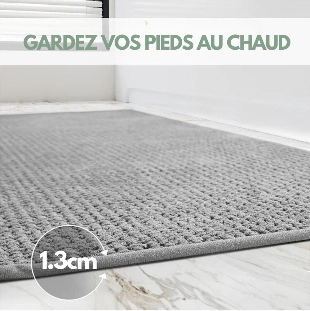 Grey textured bath mat 1.3cm thick for warmth and comfort.