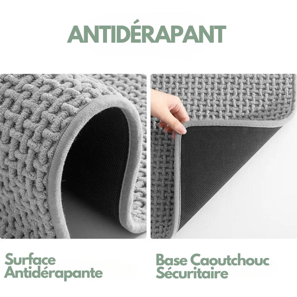 Grey textured bath mat with non-slip rubber backing for safety and comfort.