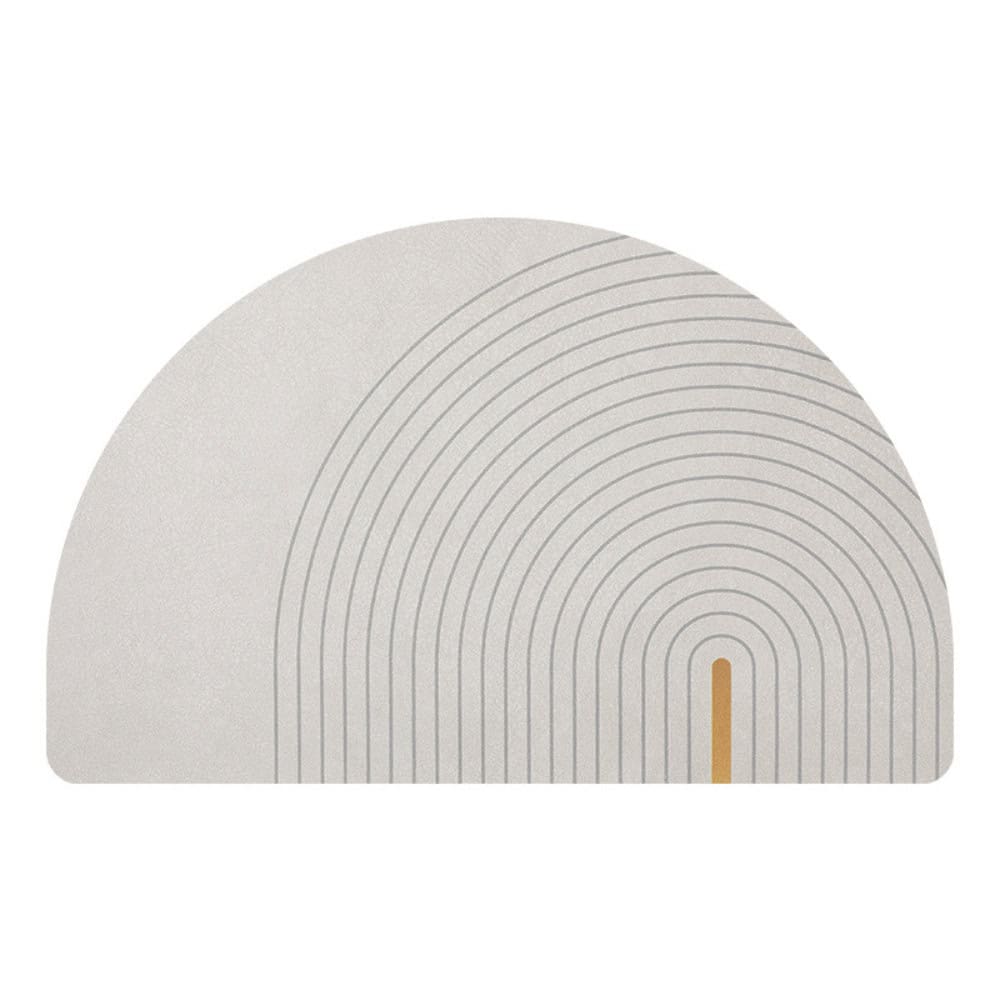 Modern half bath mat with concentric arch design and gold accent.