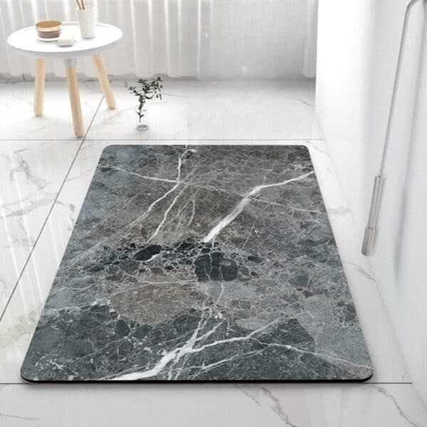 Large anti-slip bath mat with grey marble pattern for bathroom safety.