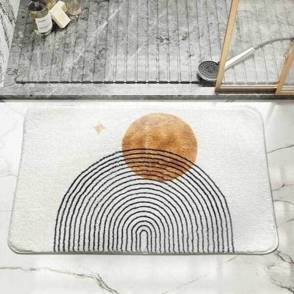 Large brown bath mat with sun and arch design for modern bathroom.