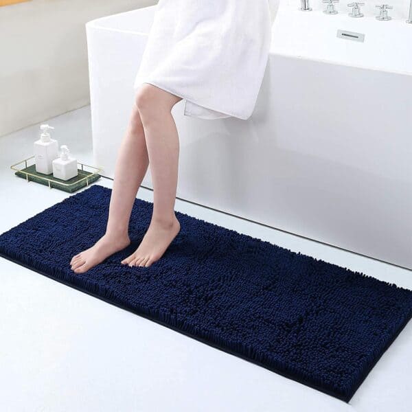 Large navy blue non-slip bath mat for bathroom safety and comfort.