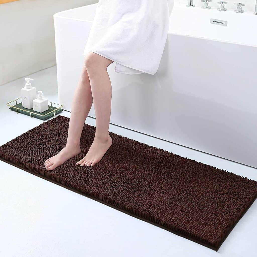 Large non-slip bath mat in brown, cozy and absorbent, perfect for bathroom safety.