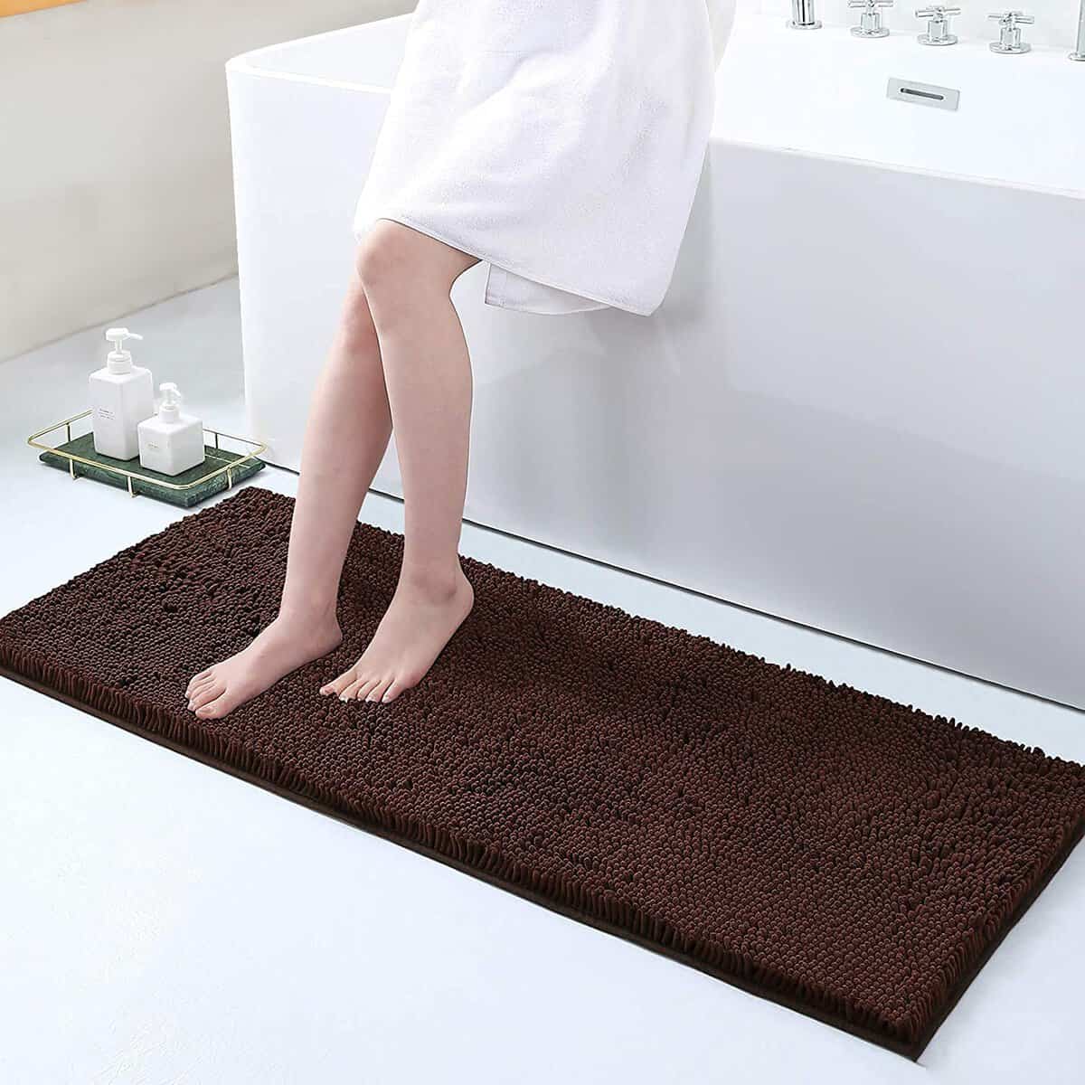 Large non-slip bath mat in brown, cozy and absorbent, perfect for bathroom safety.