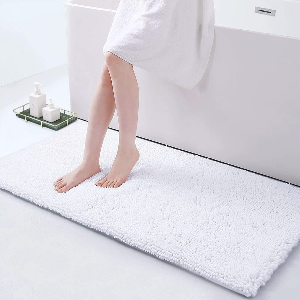 Large white non-slip bath mat for bathroom safety and comfort.