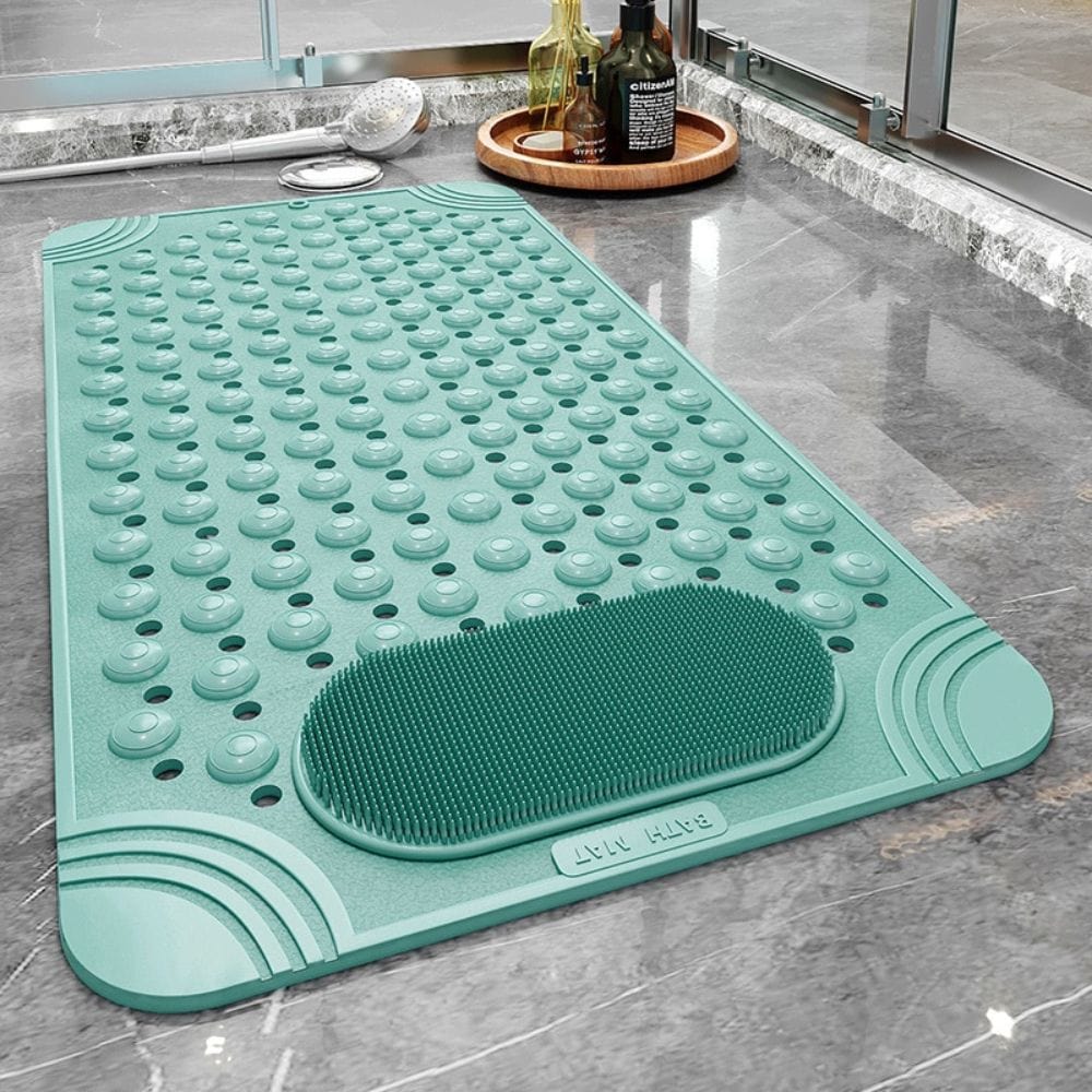 Long rectangular bath mat with massage bumps and foot scrubber.