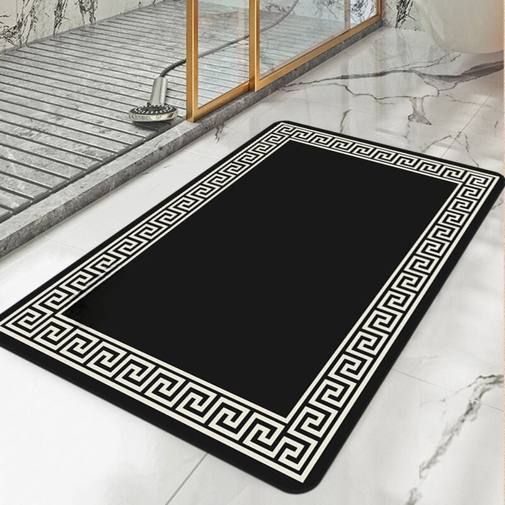 Luxury black bath mat with Greek key pattern for modern bathroom.