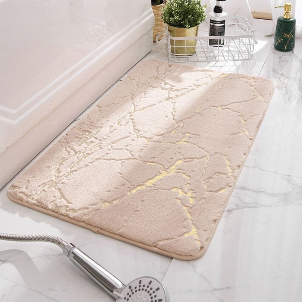 Marble Effect Bath Mat with Gold Accents for Luxury Bathroom.