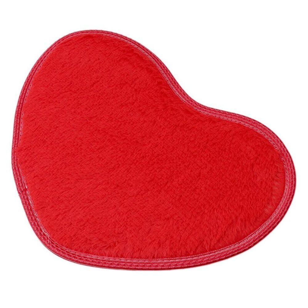 Red heart-shaped microfiber chenille bath mat for cozy bathroom decor.