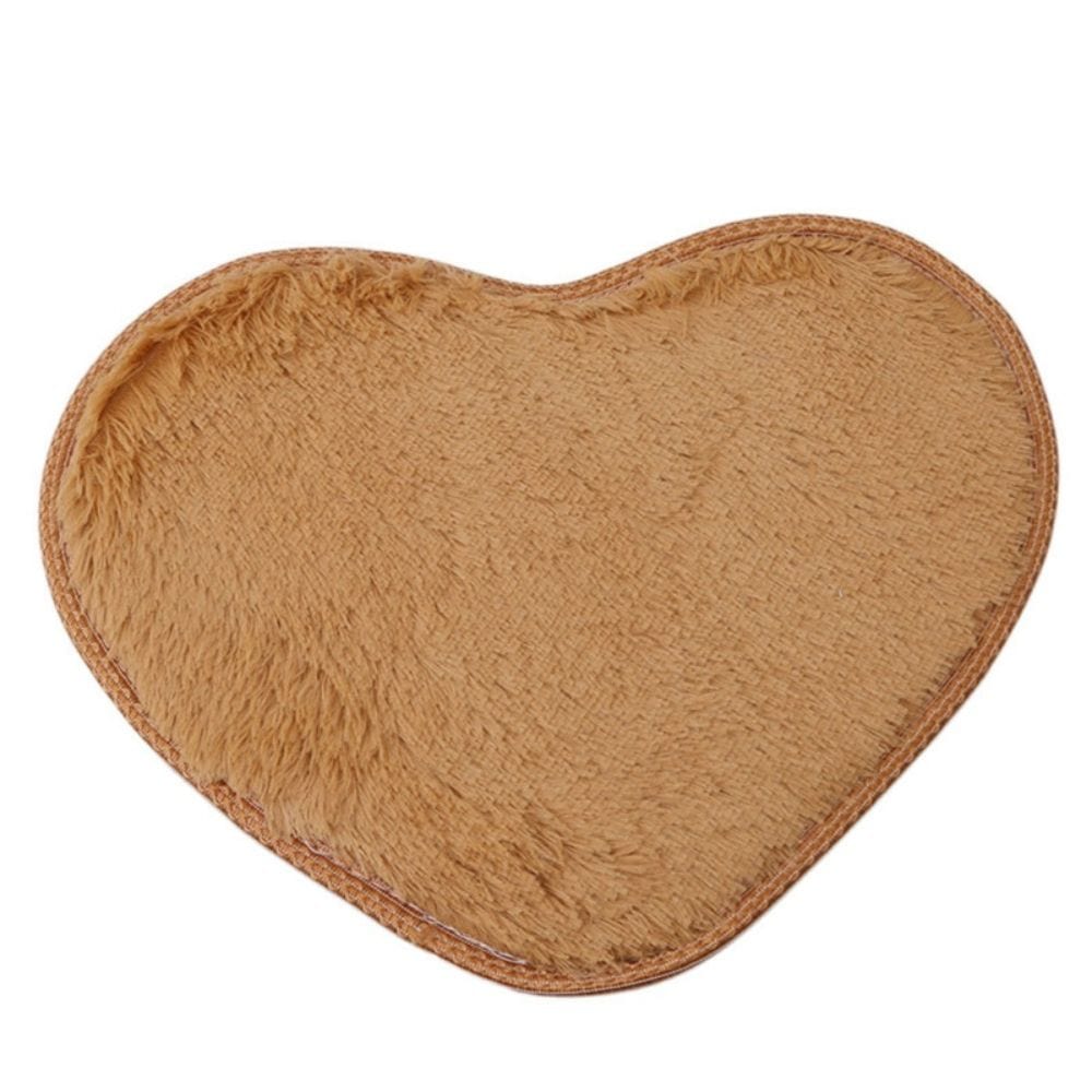 Heart-shaped microfiber chenille bath mat, soft plush texture, cozy bathroom accessory.