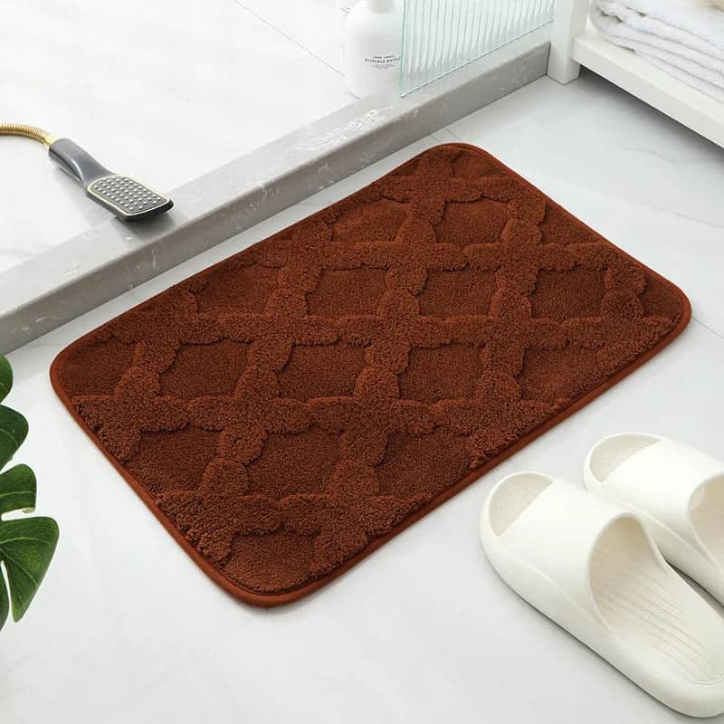 Brown microfibre bath mat with diamond pattern for bathroom.