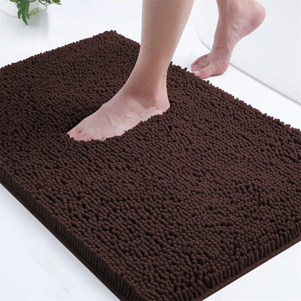 Brown microfiber bath mat with textured surface for comfort and grip.