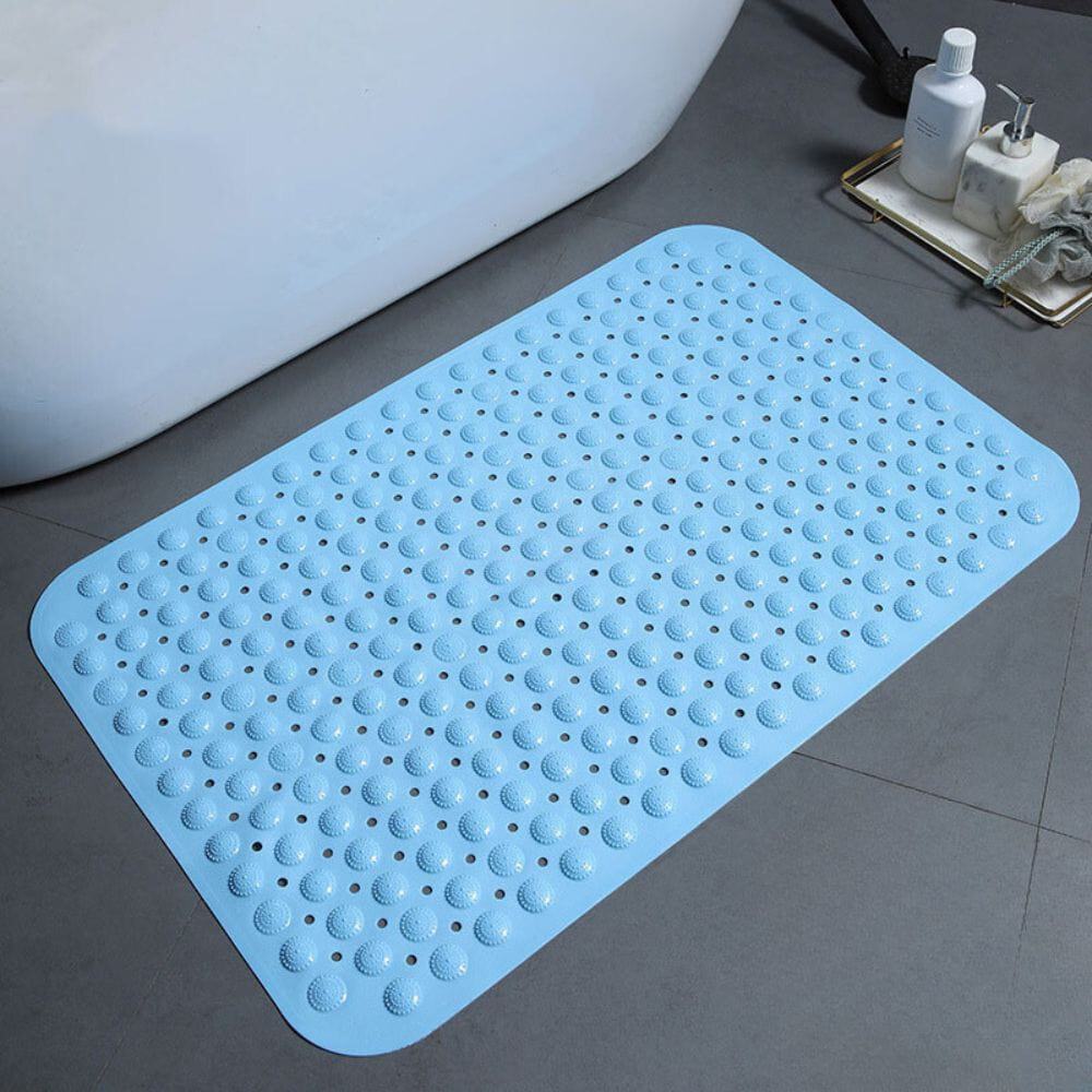 Light blue non-slip bath mat with textured grip dots for safety in bathroom.
