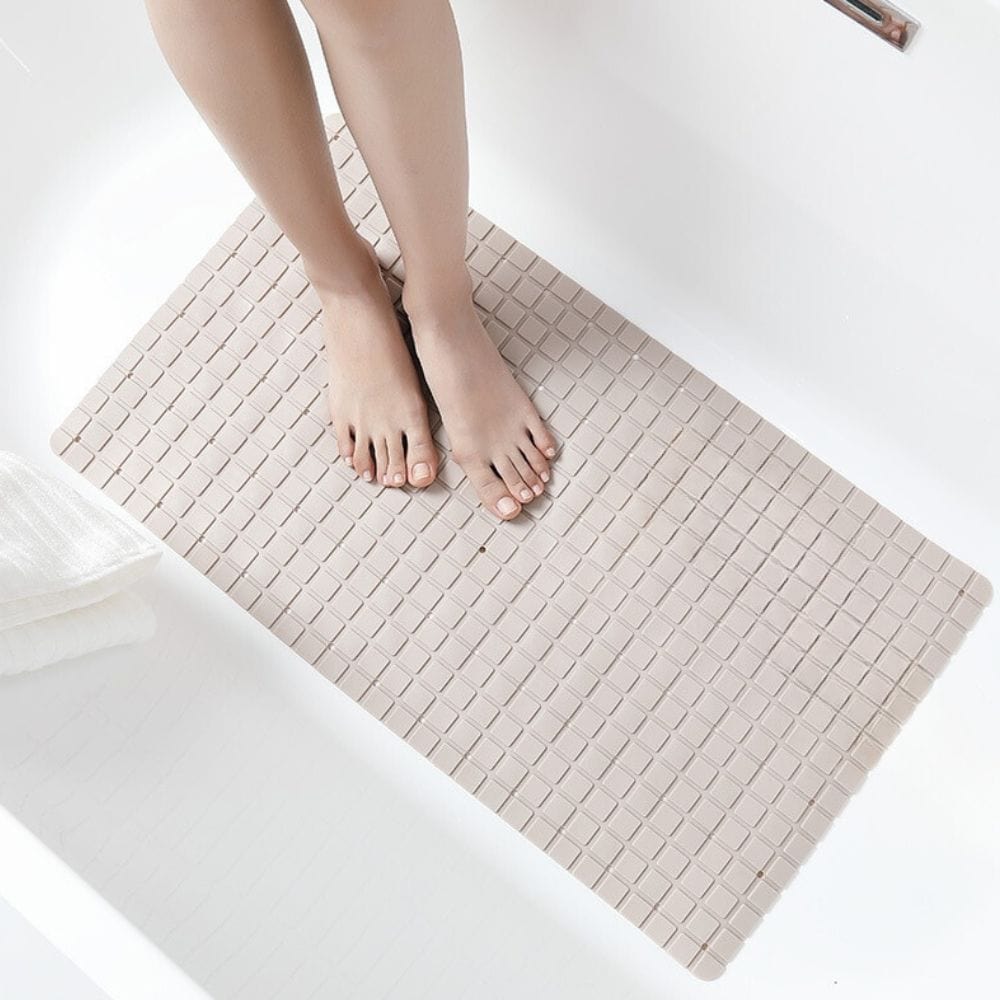 Non slip bath mat for elderly, textured safety mat in bathroom.