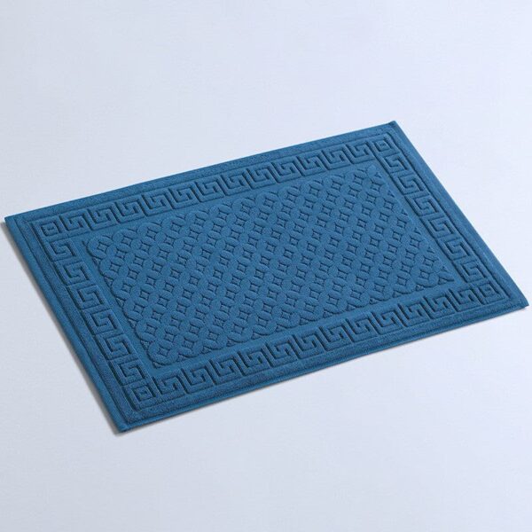 Blue non-slip cotton bath mat with Greek key border design.