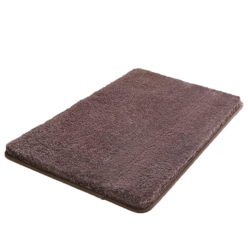 Brown non-slip bath mat for bathroom safety and comfort.