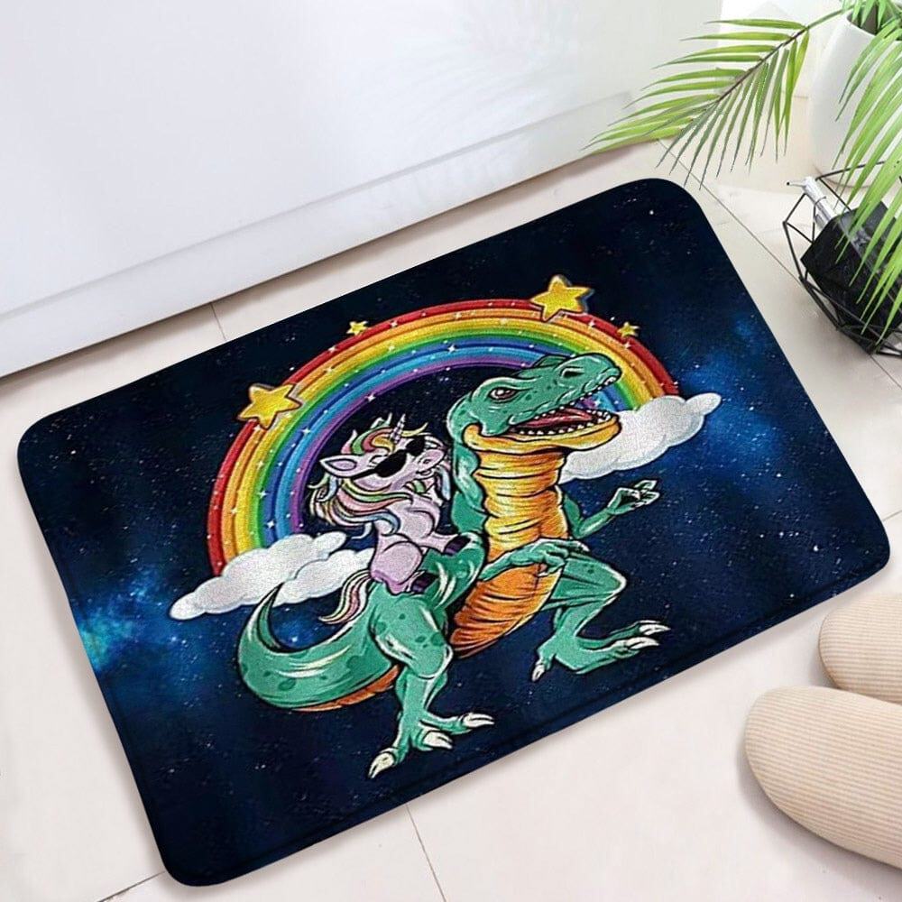 Novelty bath mat with unicorn riding dinosaur under rainbow.