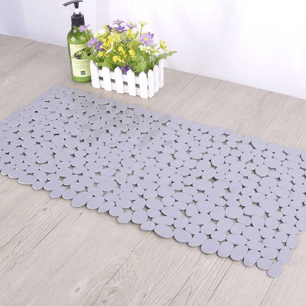 Plastic Non Slip Bath Mat with Pebble Design for Bathroom Safety.