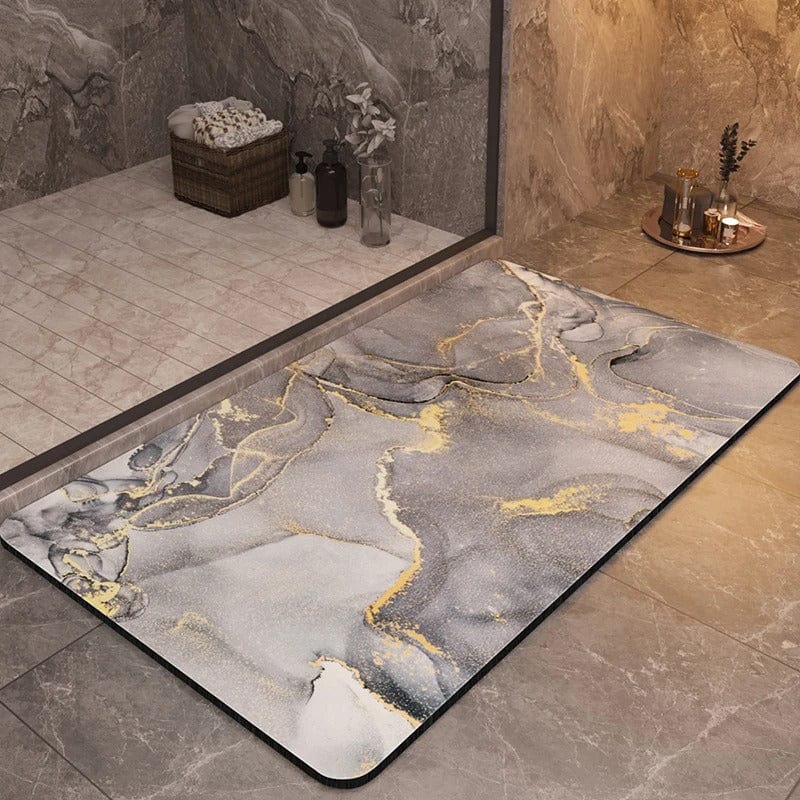 Luxury non-slip bath mat with grey and gold marble design for modern bathroom.