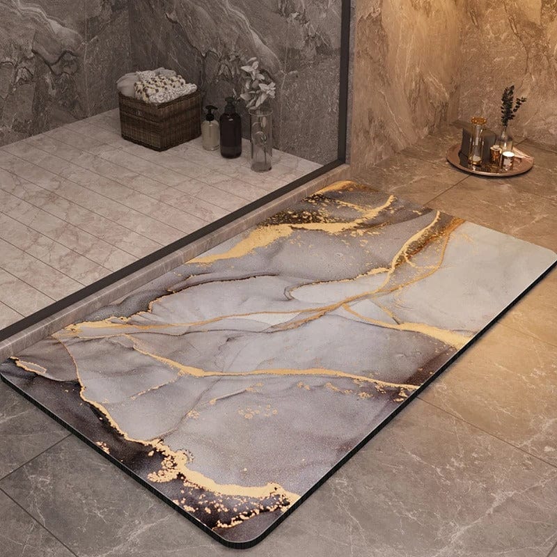 Luxury non-slip bath mat with gold marble design for modern bathroom.