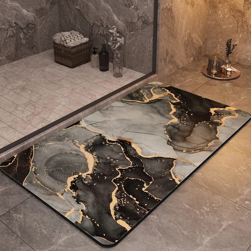 Luxury non-slip bath mat with black and gold marble design for modern bathrooms.