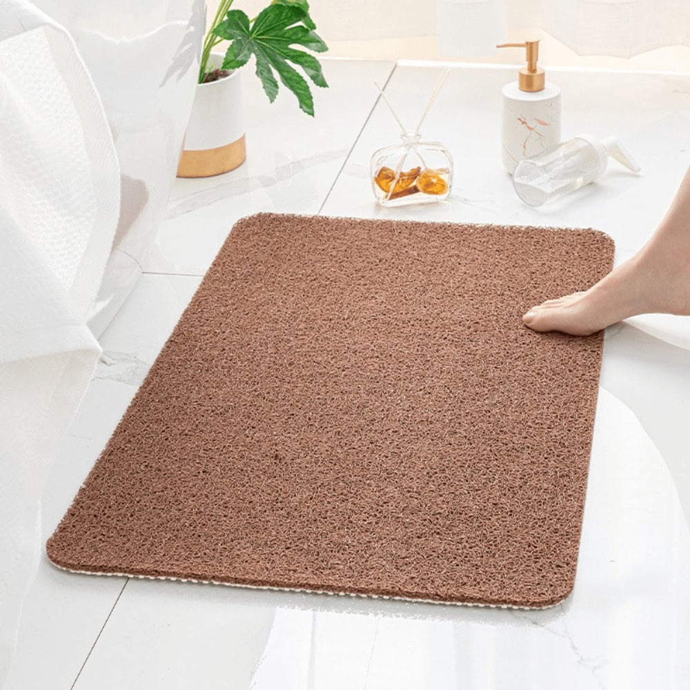 Brown non-slip shower bath mat for bathroom safety and comfort.