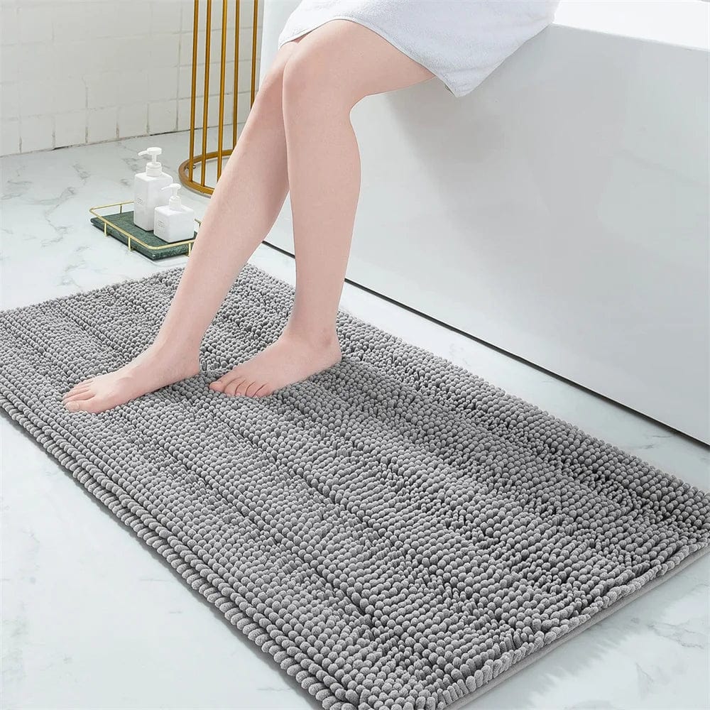 Gray textured small bath mat for bathroom comfort and style.