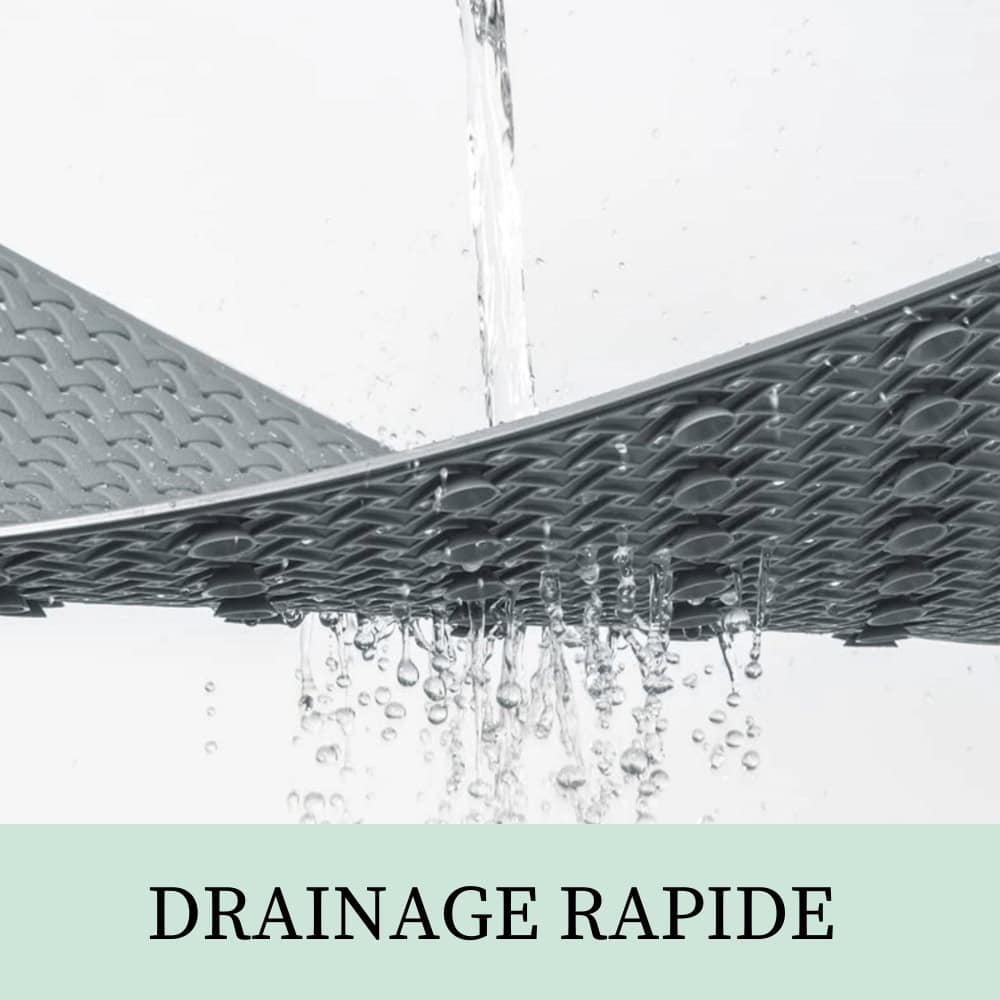 Small shower bath mat with rapid drainage design for quick water removal.