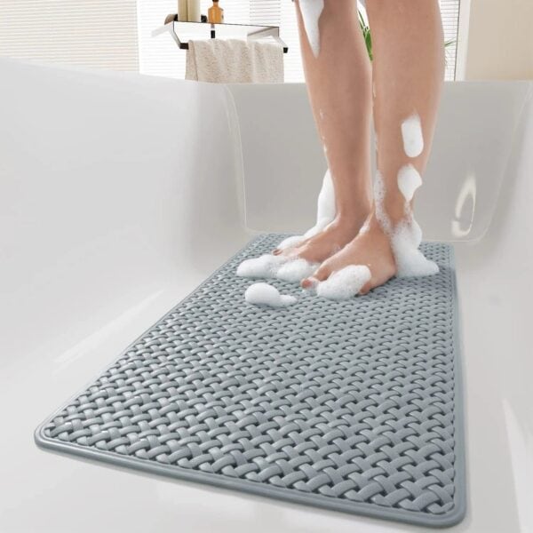 Gray woven shower bath mat with foam, non-slip bathroom mat for safety.