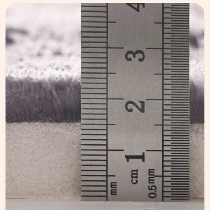 Super thick bath mat thickness measurement with ruler.