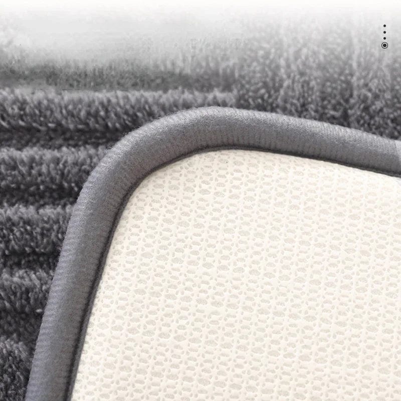 Super thick bath mat close-up showing plush texture and durable border.