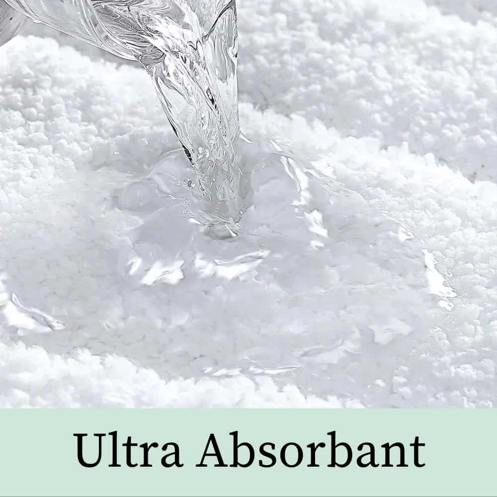 Ultra Absorbent Tan Bath Mat Soaking Up Water.