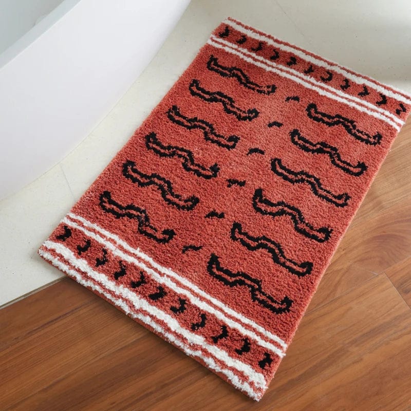 Tiger Print Bath Mat with Mustache Pattern in Rust Color.