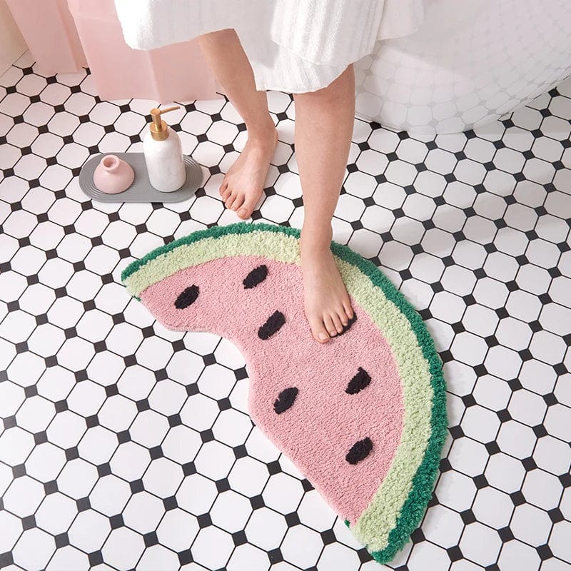 Watermelon slice bath mat for kids, playful bathroom decor.